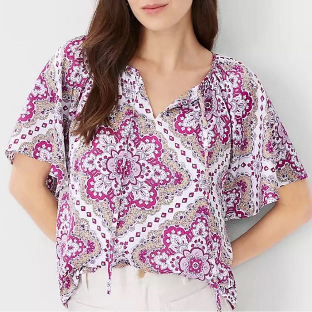 Ann Taylor White and Magenta Paisley Short Sleeve Blouse.  Fits more like a M.